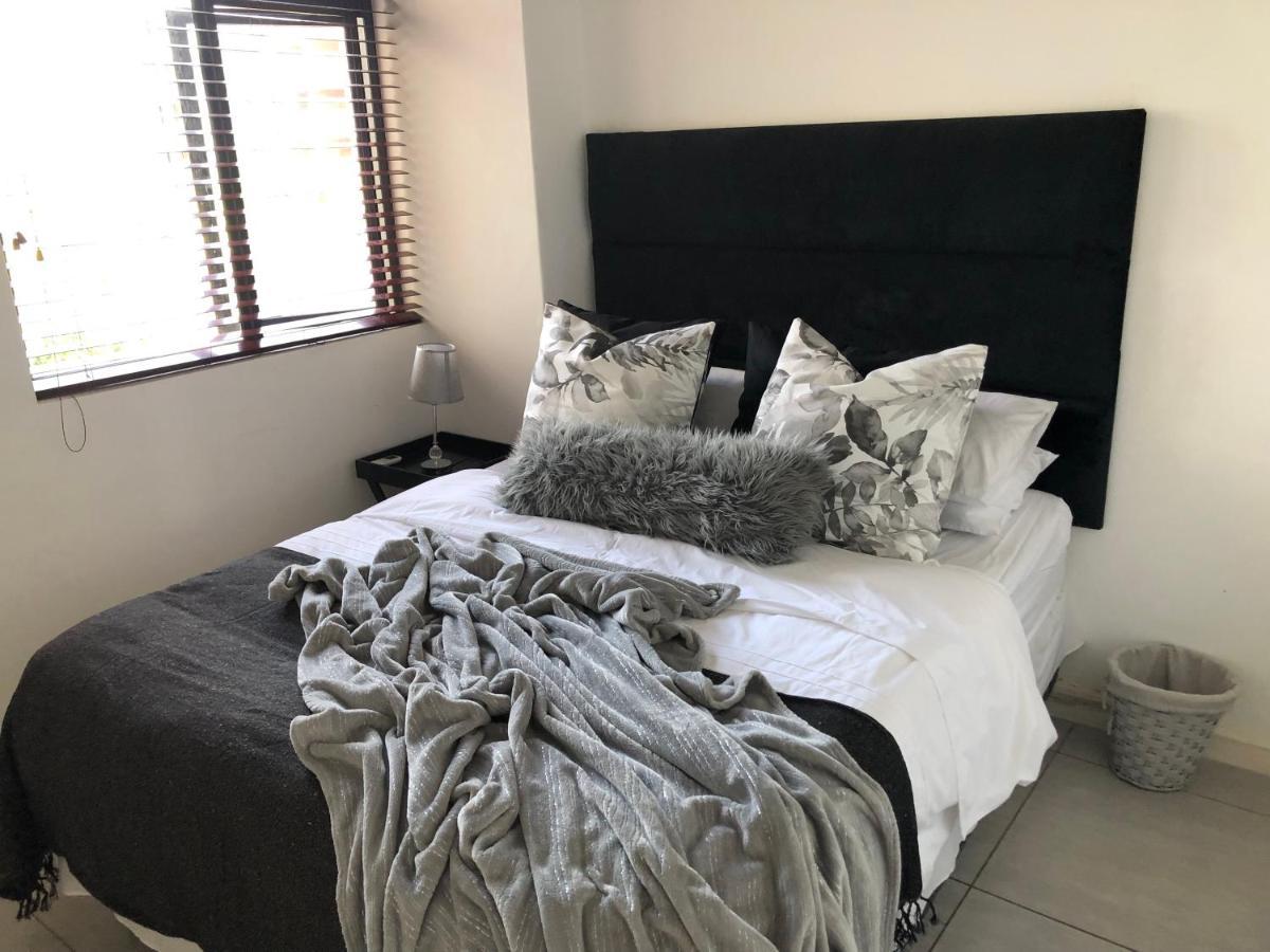 Coral Point Apartment อัมลังงา ภายนอก รูปภาพ